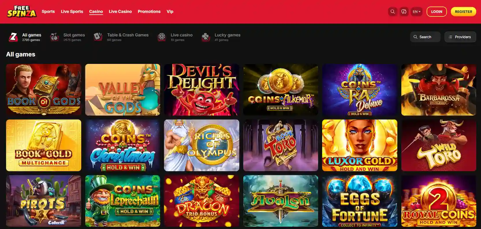 FreeSpinza Casino full game library showing featured slot titles and navigation menu on a dark background