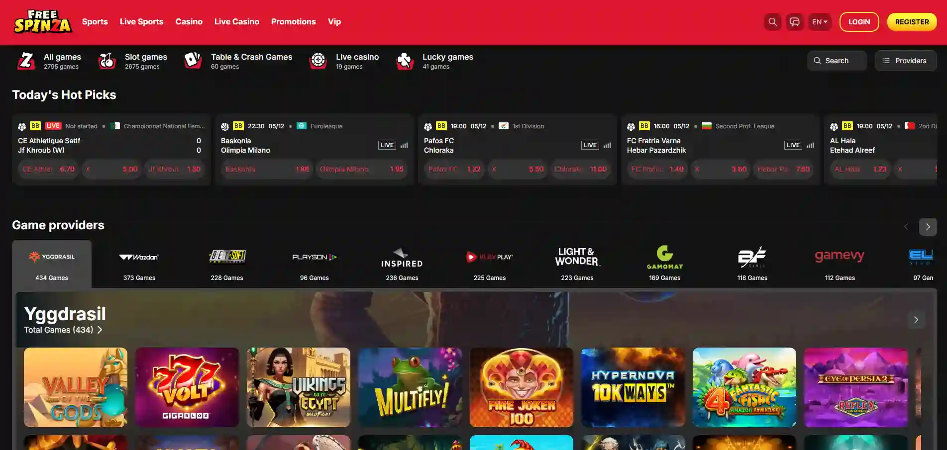 FreeSpinza Casino homepage showing hot game picks, software provider logos, and the main navigation menu on a dark background.