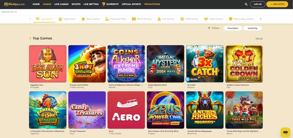 WinMega Casino game lobby page displaying Top Games category with titles including Egyptian Sun and 3 Super Hot Chilies alongside navigation menu and login options
