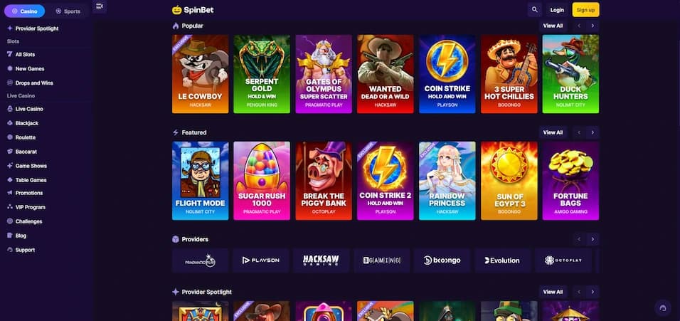 Spinbet Casino lobby displaying featured games, popular titles, provider filters, and navigation menu options
